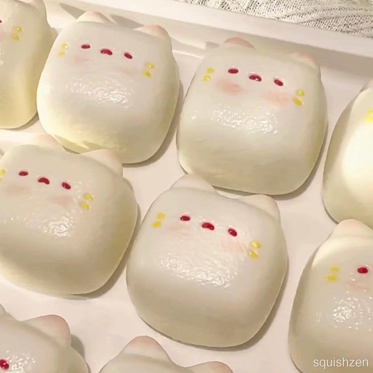 Milk candy cat kitty head bursting water-like texture taba squishy toy (240g)