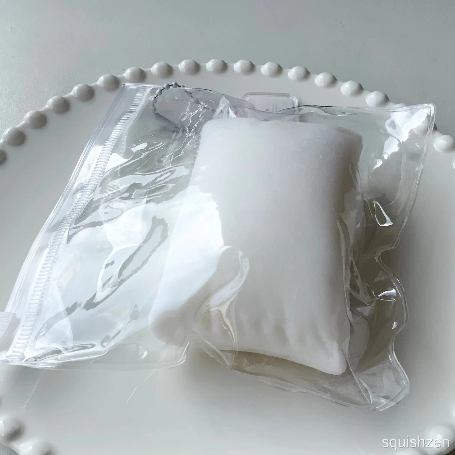 Flocked white pillow taba squishy toy (130g)