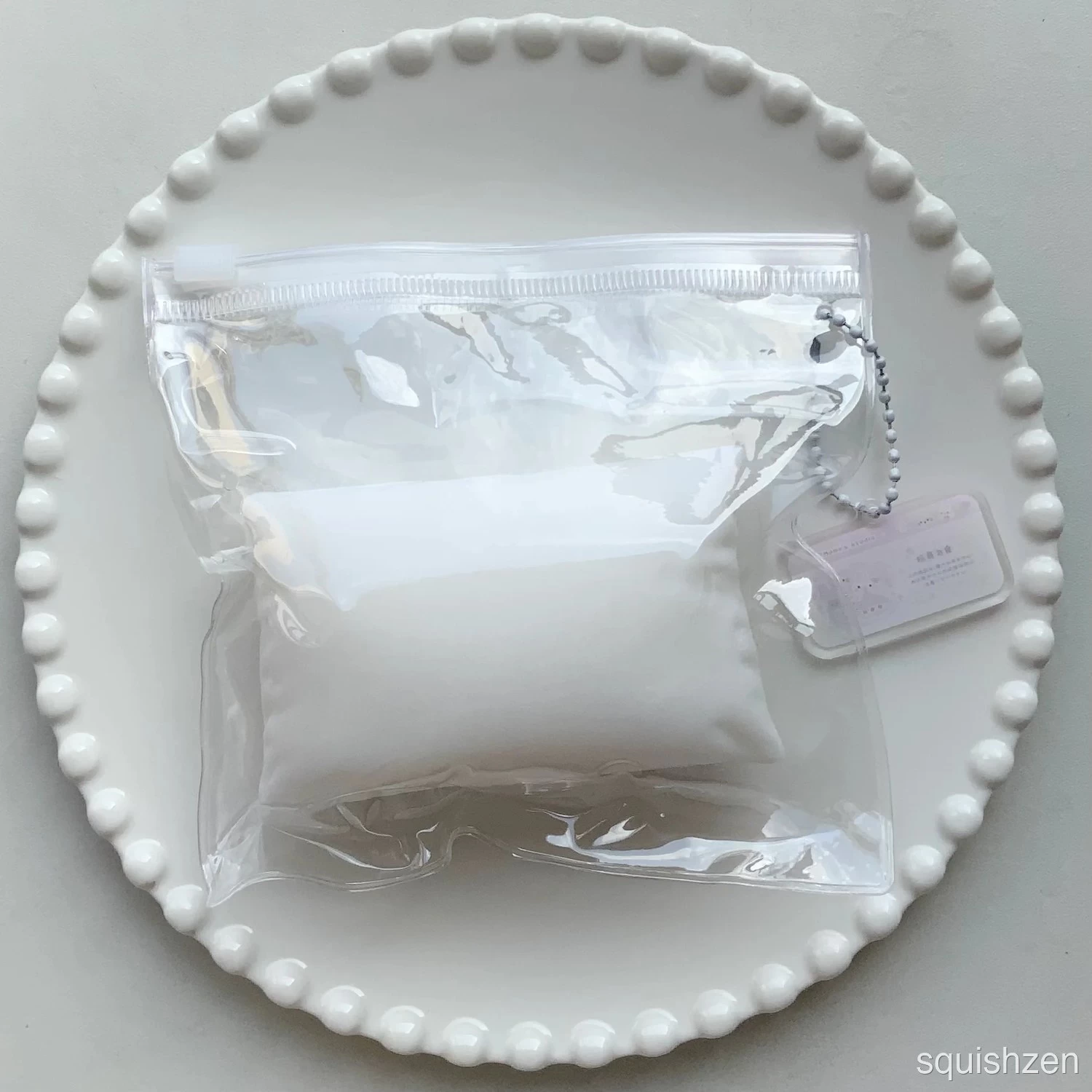 Flocked white pillow taba squishy toy (130g)