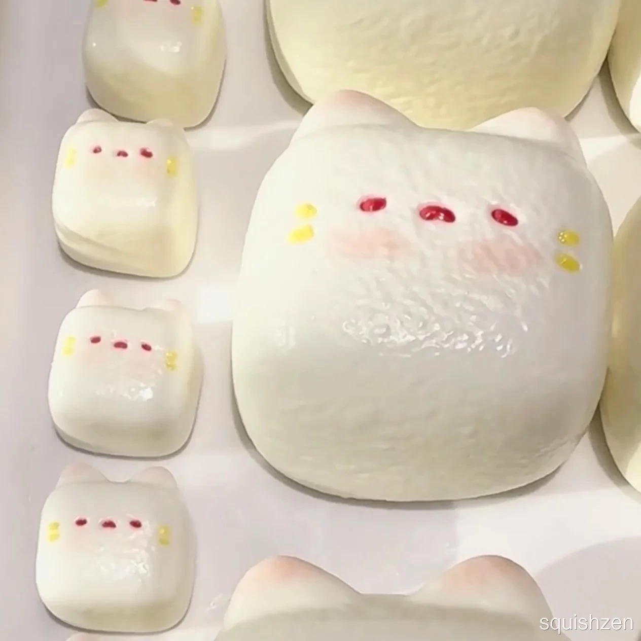 Milk candy cat kitty head bursting water-like texture taba squishy toy (240g)